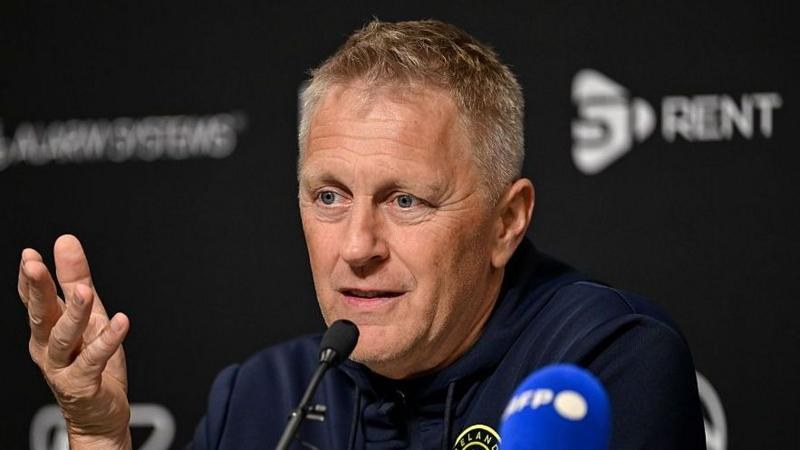 Republic of Ireland manager Heimir Hallgrimsson speaking into a microphone at a news conference